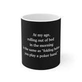 Funny Senior Humor Mug — "At my age, rolling out of bed... is the same as 'folding before you play a poker hand.'"